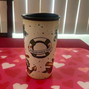 Starbucks hot cup 
Vintage Tattoo Dot Double Wall Traveler, 12 Fl Oz